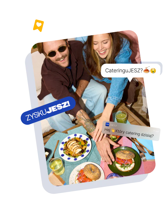 Para przy stole z posiłkami z cateringu dietetycznego