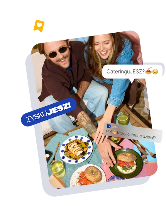 Para przy stole z posiłkami z cateringu dietetycznego